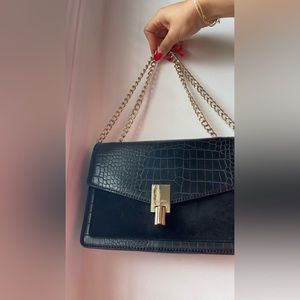 Aldo clutch- very elegant